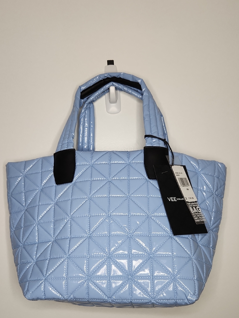Light Blue Quilted Tote Bag with Black Accents